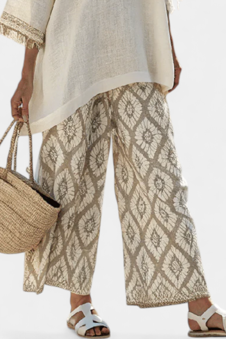 Compleet Boho Chic Daisy: Lange Blouse en Broek met Print voor een Unieke Stijl