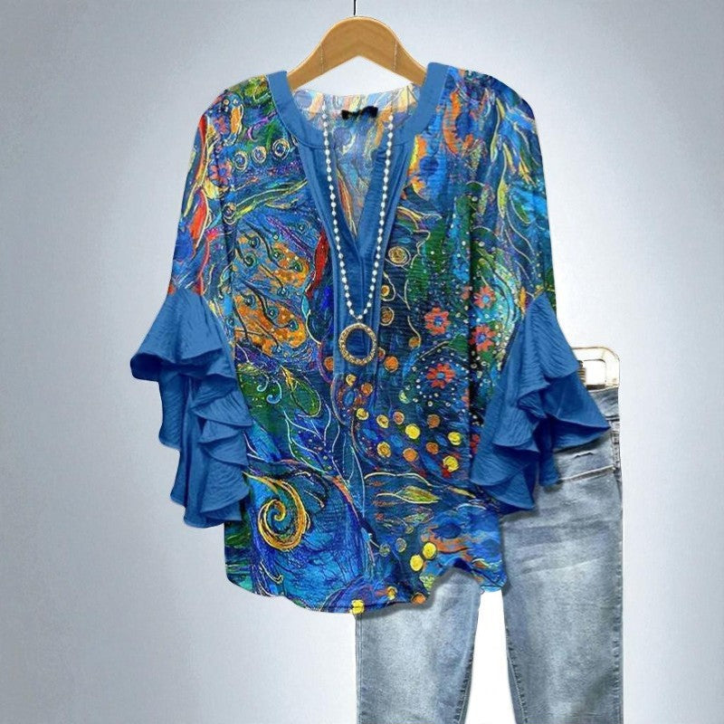 Aurianne – Artistieke blouse in levendige kleuren met uitlopende mouwen