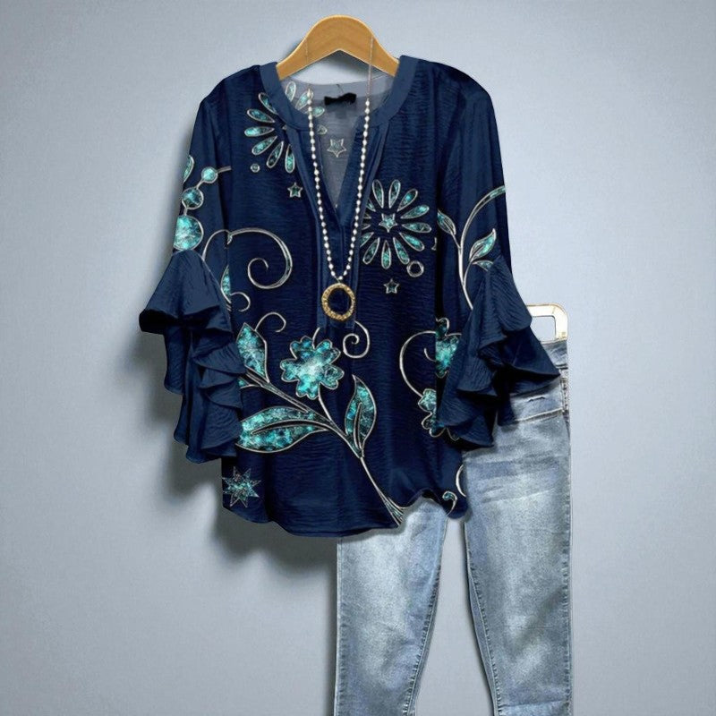 Marcelle – Donkerblauwe Blouse met Turquoise Bloemaccenten